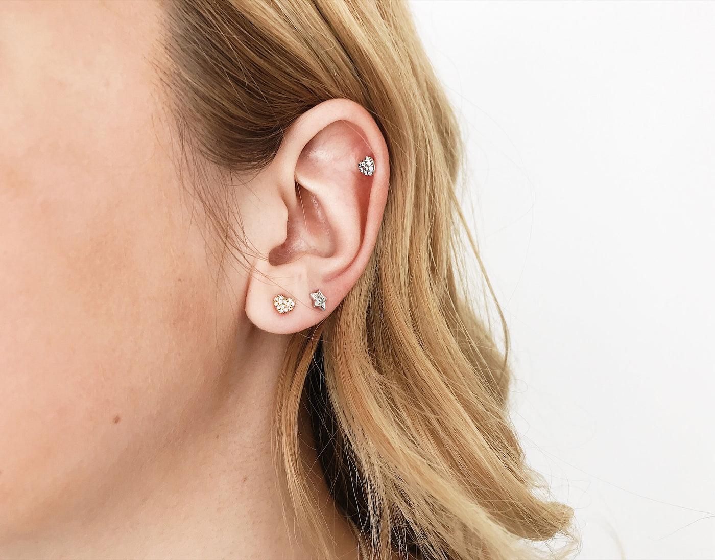 Diamond heart stud earrings